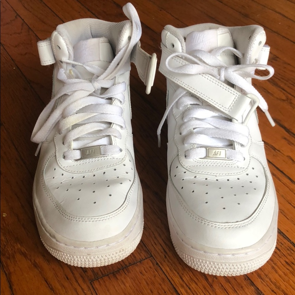 All white Hightop Nike Air Force Ones